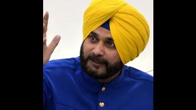 Navjot Singh Sidhu meets Congress leaders to reach consensus on leader of opposition post Navjot Singh Sidhu meets Congress leaders to reach consensus on leader of opposition post