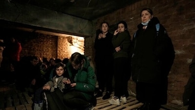 People shelter underground following explosions in Lviv, western Ukraine, Saturday, March 26, 2022.&nbsp; (AP)