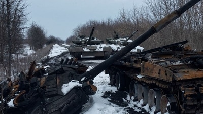 A charred Russian tank and captured tanks are seen, amid Russia's invasion of Ukraine, in the Sumy region, Ukraine.&nbsp; (via REUTERS)