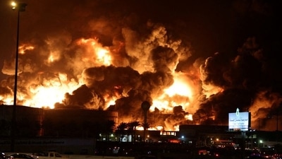 Smoke billows from a fire at Saudi Aramco's petroleum storage facility after an attack in Jeddah, Saudi Arabia March 25, 2022. (Reuters)