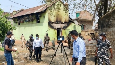 CBI experts during the probe at Bogtui village, in Birbhum on Saturday. (ANI)