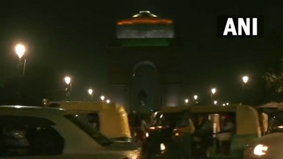 The iconic India Gate in New Delhi goes dark to mark Earth Hour on Saturday, March 26, 2022. (ANI Photo) The iconic India Gate in New Delhi goes dark to mark Earth Hour on Saturday, March 26, 2022. (ANI Photo)