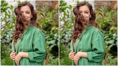 In golden earstuds and golden chain from the shelves of Romanar Singhani, Dia accessorised her look to perfection as she posed amidst the greenery. (Instagram/@diamirzaofficial)
