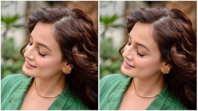 Styled by Jia Chauhan, Dia wore her tresses open in wavy curls with a side part. Assisted by makeup artist Shraddha Mishra, Dia decked up in nude eyeshadow, black eyeliner, mascara-ladne eyelashes, drawn eyebrows, contoured cheeks and a shade of nude lipstick. (Instagram/@diamirzaofficial)