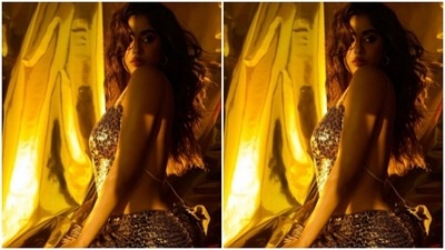 Janhvi paired a slip-in midriff-baring animal-printed backless top with a satin pencil skirt of the same print. In nude stilettos, Janhvi completed the look to perfection. (Instagram/@chandiniw)