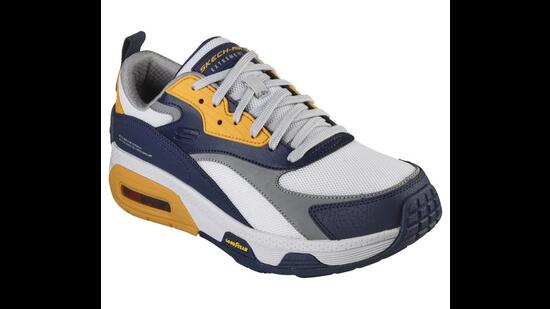 The shoes are in a trendy colour combination of white, navy, and yellow and are ideal for casual and daywear