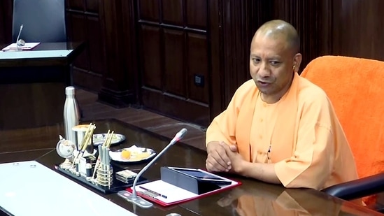 Lucknow, Mar 25 (ANI): Uttar Pradesh Chief Minister Yogi Adityanath holds the first meeting of the council of ministers in the state, in Lucknow on Friday.(ANI)