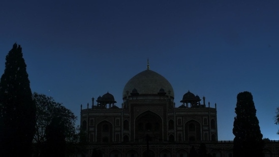 View of Humayun's Tomb after its lights were turned off to conserve energy, during Earth hour, in New Delhi, Saturday, March 26, 2022. (PTI Photo)