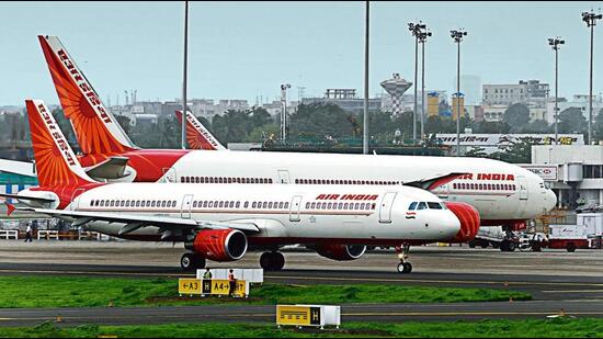 The Airports Authority of India scrapped the rule of leaving three seats vacant in flights. It also said that the crew members will not be required to wear a complete personal protection kit (PPE) when international flight operations resume on March 27. (HT PHOTO.) The Airports Authority of India scrapped the rule of leaving three seats vacant in flights. It also said that the crew members will not be required to wear a complete personal protection kit (PPE) when international flight operations resume on March 27. (HT PHOTO.)