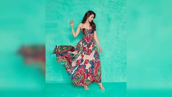 The dress featured multicoloured ikat print with hand micro pleats and a bustier design around the chest.(Instagram/@rakulpreet)