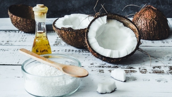1. DIY hair masking with coconut-based hair oil and curd - It is an easy remedial way of treating dandruff at home as curd has an anti-microbial effect that ensures healthy scalp. Coconut-based hair oil improves the skin barrier and it forms an occlusive layer from within. (Photo by Tijana Drndarski on Unsplash)