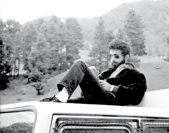 Naseeruddin Shah atop a van at the outdoor location of Karma