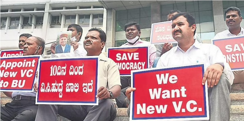 Faculty members and student representatives protested outside Bengaluru University on Friday as a VC has not yet been appointed even after 10 days. (TNIE photo)