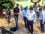 Central Bureau of Investigation (CBI) experts conducting a probe around the houses which were set on fire in Birbhum in West Bengal. (ANI PHOTO.)(HT_PRINT) Central Bureau of Investigation (CBI) experts conducting a probe around the houses which were set on fire in Birbhum in West Bengal. (ANI PHOTO.)(HT_PRINT)
