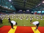 The Qatar yoga event saw a participation of 114 nationalities. (Picture tweeted by Indian Embassy in Qatar) (Twitter) The Qatar yoga event saw a participation of 114 nationalities. (Picture tweeted by Indian Embassy in Qatar) (Twitter)