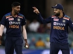 Jasprit Bumrah (L) and Virat Kohli. Jasprit Bumrah (L) and Virat Kohli. 