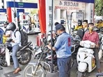 Motorcyclists wait in queues to get their vehicles filled with fuel, at a petrol pump in Navi Mumbai. (PTI file) Motorcyclists wait in queues to get their vehicles filled with fuel, at a petrol pump in Navi Mumbai. (PTI file)