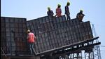 Labourers work at a flyover construction site in New Delhi. (Representative image/AFP File) Labourers work at a flyover construction site in New Delhi. (Representative image/AFP File)
