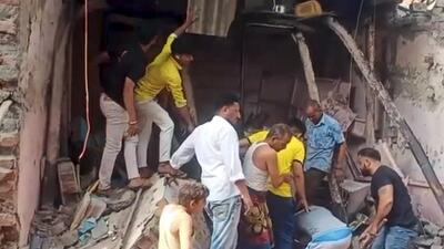 Rescue operation underway after a building collapsed in Kandivali area on Saturday. (PTI)