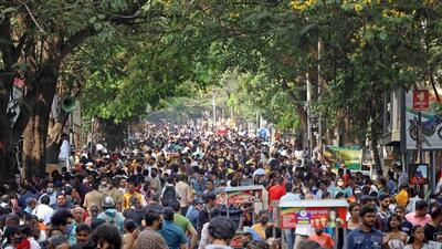 Visitors during the 19th Chitra Santhe exhibition at Karnataka Chitrakala Parishat, in Bengaluru, on Sunday. (PTI) Visitors during the 19th Chitra Santhe exhibition at Karnataka Chitrakala Parishat, in Bengaluru, on Sunday. (PTI)