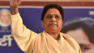 Lucknow: BSP supremo Mayawati waves at the party leaders, during a review meeting to discuss the party's performance in the recent Assembly polls, at the party office, in Lucknow, (PTI) Lucknow: BSP supremo Mayawati waves at the party leaders, during a review meeting to discuss the party's performance in the recent Assembly polls, at the party office, in Lucknow, (PTI)
