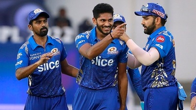Basil Thampi of Mumbai Indians celebrating the wicket of Rovman Powell of Delhi Capitals, during the second T20 cricket match of the Indian Premier League 2022 (PTI)
