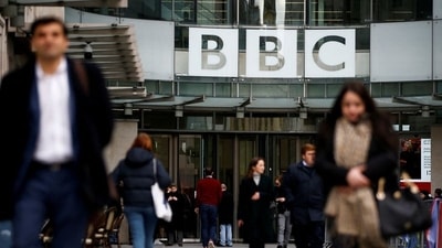 Pedestrians walk past a BBC logo at Broadcasting House in London,&nbsp; (REUTERS file)