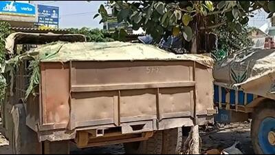 The impounded tractor-traler laden with sand impounded near Kler village in Faridkot district.