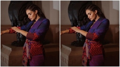 Gabriella paired a black tube top with a multicoloured oversized blazer and a pair of black formal trousers with wide legs. Gabriella’s full-sleeved blazer came printed in colours of blue, red and yellow. It also had a knot detail near to the waist. (Instagram/@gabriellademetriades)
