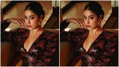 Janhvi’s dress came intricately decorated in hues of red, black and grey. The actor further accessorised it with an emerald stone-studded ring and silver hoop earrings from the house of Tyaani Fine Jewellery. (Instagram/@janhvikapoor)