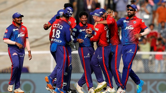 Delhi Capitals players celebrates the wicket of Kieron Pollard of Mumbai Indians, during the second T20 cricket match of the Indian Premier League 2022(PTI)