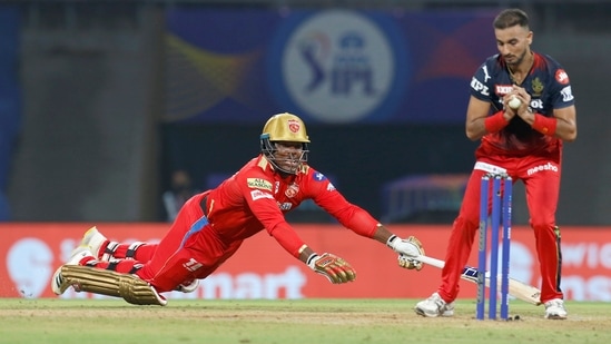 Odean Smith of Punjab Kings dives to save his wicket against RCB(PTI)