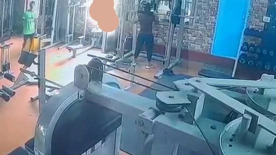 Screengrab of CCTV footage of the woman right before she collapses in the gym (Youtube)