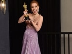 Jessica Chastain, winner of the award for best performance by an actress in a leading role for The Eyes of Tammy Faye, poses in the press room at the Oscars at the Dolby Theatre in Los Angeles. (AP)