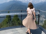Pleated midi dresses are lightweight, easy to carry and an ideal summer wear.
