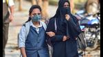 A student wearing a headscarf arrives to attend the classes at Desheeya Vidhyashala Samithi PU College in Shivamogga, February 18, 2022 (PTI) A student wearing a headscarf arrives to attend the classes at Desheeya Vidhyashala Samithi PU College in Shivamogga, February 18, 2022 (PTI)