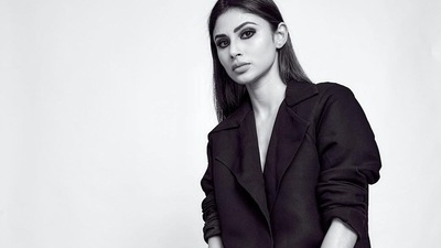 Taking to her social media handle, Mouni shared a slew of pictures featuring her donning a black co-ord pantsuit and we are hooked to her mesmerizing look. The ensemble is credited to Indian fashion label, D Shik by Rishika. (Instagram/imouniroy) Taking to her social media handle, Mouni shared a slew of pictures featuring her donning a black co-ord pantsuit and we are hooked to her mesmerizing look. The ensemble is credited to Indian fashion label, D Shik by Rishika. (Instagram/imouniroy)