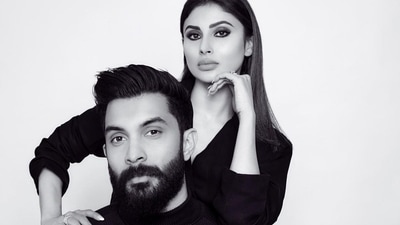 The sizzling trend of shirtless pantsuits is nothing new but Bollywood hottie Mouni Roy only takes the sultry style bar a notch higher every time she dons the power dressing ensemble and this Monday was no different as she posed in an oversized black pantsuit during smoking hot monochrome photoshoot with hubby and ‘co-conspirator’ Suraj Nambiar. (Instagram/imouniroy) The sizzling trend of shirtless pantsuits is nothing new but Bollywood hottie Mouni Roy only takes the sultry style bar a notch higher every time she dons the power dressing ensemble and this Monday was no different as she posed in an oversized black pantsuit during smoking hot monochrome photoshoot with hubby and ‘co-conspirator’ Suraj Nambiar. (Instagram/imouniroy)