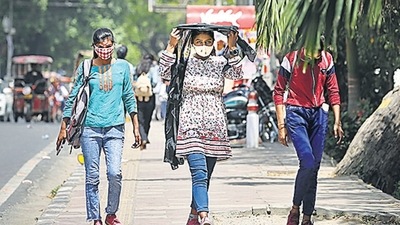 People outside Delhi University’s North Campus in New Delhi on Monday. (Sanchit Khanna/ HT photo)