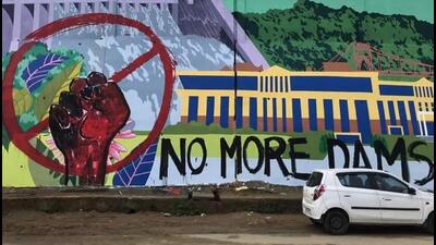 The duo have been accused of defacing a mural called Wall of Harmony painted on the outside wall of the civil secretariat in Itanagar to commemorate 50 years of naming of Arunachal Pradesh. (SOURCED.) The duo have been accused of defacing a mural called Wall of Harmony painted on the outside wall of the civil secretariat in Itanagar to commemorate 50 years of naming of Arunachal Pradesh. (SOURCED.)