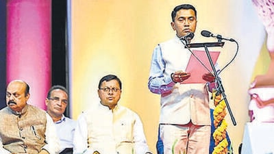 Goa, India - March 28, 2022: Pramod Sawant takes oath as the Chief Minister of Goa for the second consecutive term during the Goa Assembly swearing-in ceremony held at the Dr. Shyamaprasad Mukherjee stadium at Taleigao, in Goa, India, on Monday, March 28, 2022. (Photo by Uday Deolekar/HT Photo) (HT PHOTO) Goa, India - March 28, 2022: Pramod Sawant takes oath as the Chief Minister of Goa for the second consecutive term during the Goa Assembly swearing-in ceremony held at the Dr. Shyamaprasad Mukherjee stadium at Taleigao, in Goa, India, on Monday, March 28, 2022. (Photo by Uday Deolekar/HT Photo) (HT PHOTO)