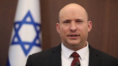 Israeli Prime Minister Naftali Bennett attends a cabinet meeting at the Prime Minister's office in Jerusalem, March 27, 2022. (Reuters)
