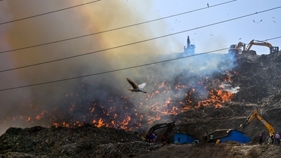 Flames and smoke rise from a fire at Ghazipur Landfill, in New Delhi, Monday. (PTI Photo) Flames and smoke rise from a fire at Ghazipur Landfill, in New Delhi, Monday. (PTI Photo)