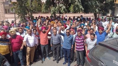 Their demands include scrapping of the labour codes, no privatisation of any form, scrapping of the National Monetisation Pipeline (NMP), increased allocation of wages under MNREGA and regularisation of contract workers among others. (HT Photo/Sanjeev Kumar)