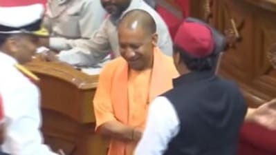UP chief minister Yogi Adityanath greets Akhilesh Yadav. (grab from a video tweeted by news agency ANI)&nbsp;