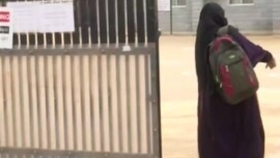 A student entering St Joseph's Convent Girls High School premises to appear for Karnataka SSLC exam on Monday. (Image for representation) (ANI) A student entering St Joseph's Convent Girls High School premises to appear for Karnataka SSLC exam on Monday. (Image for representation) (ANI)
