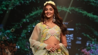 Pooja Hegde walks the ramp looking like a floral wonder in bespoke lehenga at Lakme Fashion Week: See pics, videos Pooja Hegde walks the ramp looking like a floral wonder in bespoke lehenga at Lakme Fashion Week: See pics, videos