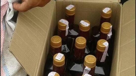 As many as 108 bottles were found in the accused’s shop and 72 in his house in Zirakpur. (HT File Photo)