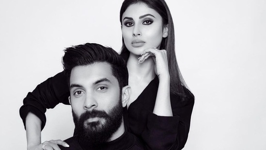 The sizzling trend of shirtless pantsuits is nothing new but Bollywood hottie Mouni Roy only takes the sultry style bar a notch higher every time she dons the power dressing ensemble and this Monday was no different as she posed in an oversized black pantsuit during smoking hot monochrome photoshoot with hubby and ‘co-conspirator’ Suraj Nambiar.&nbsp;(Instagram/imouniroy)