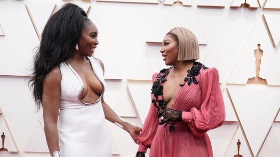 Tennis icons and sister-duo Venus Williams and Serena Williams, who served as executive producers on Oscar-nominated King Richard, looked absolutely gorgeous as they walked the red carpet at the 94th Academy Awards. Venus dazzled in a custom plunging Elie Saab gown, and Serena looked breathtaking in a pink Gucci gown.(Jae C. Hong/Invision/AP)